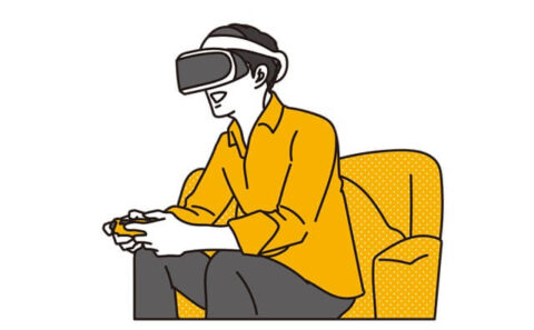 VRヘッドマウントディスプレーでゲームをする人